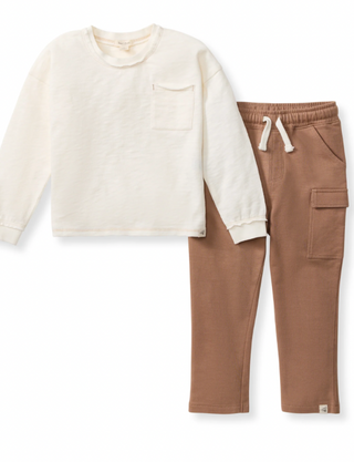 White long-sleeve shirt and brown pants on a white background