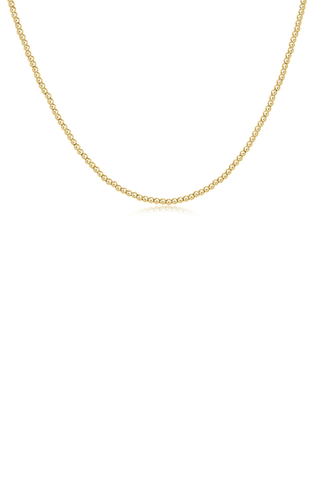 Gold chain necklace on a white background