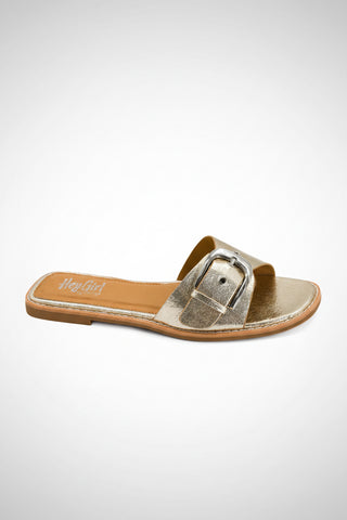 Gold sandal with a buckle on a white background