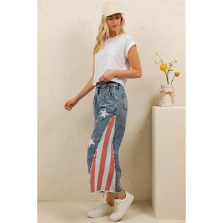 girl wearing flag pants
