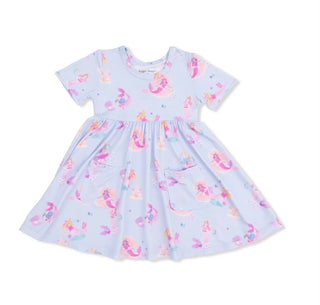 Children's dress with mermaid pattern on a white background