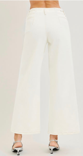 Back view white jeans with low back exposure on white background 