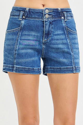 Blue denim shorts on a white background