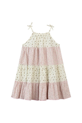 Floral dress with pink and white pattern on a white background