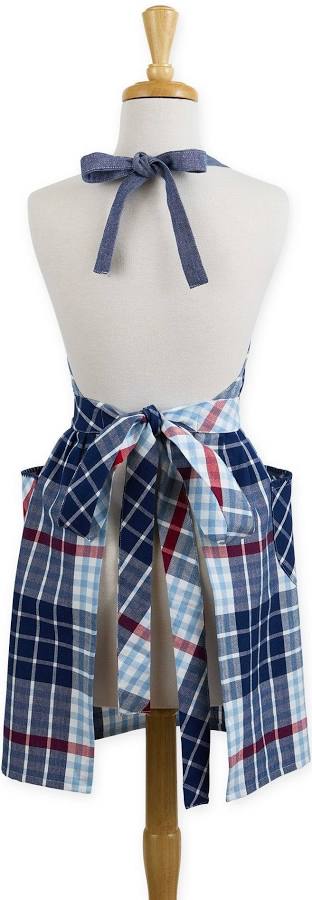 Plaid apron with a bow on a mannequin against a white background