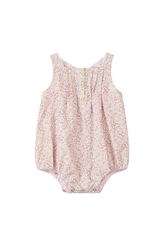 Floral baby romper on a white background