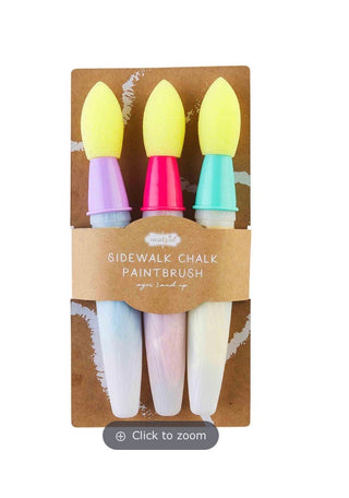 Set of three colorful sidewalk chalk paintbrushes in packaging on a white background