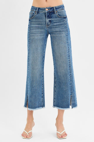 Blue jeans with a white background