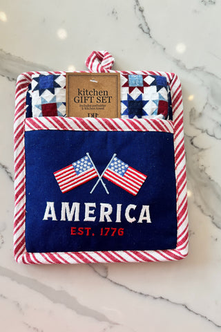Potholder with American flag design and text on a marble surface