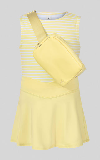 Yellow dress with a matching crossbody bag on a light gray background