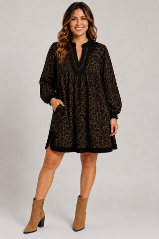 Women modeling in umgee leoprad dress