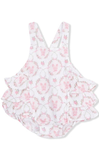 White swimsuit with pink floral pattern on a white background