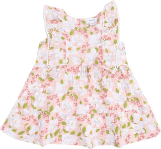 Floral dress with pink and green pattern on a white background