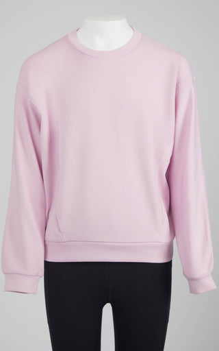 Pink sweatshirt on a mannequin with a gray background