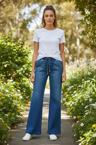 Blue denim wide-leg pants on a white background