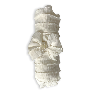 White lace dress with floral details on a white background