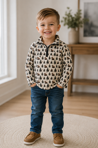 little boy wearing the shirt.