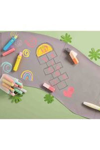 Children's drawing on a road-themed paper with colorful markers.