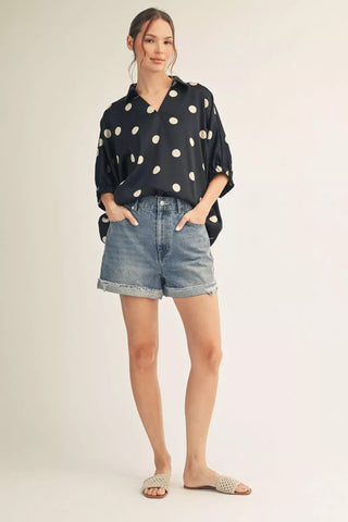 women wearing top and shorts. 