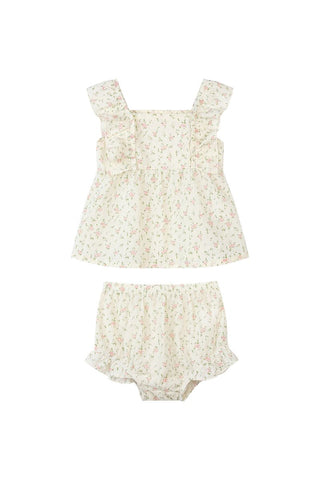 Floral baby romper set on a white background