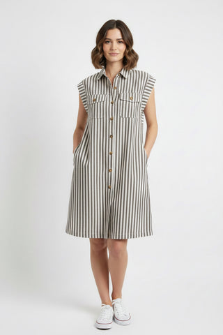 Woman wearing a striped sleeveless dress on a white background