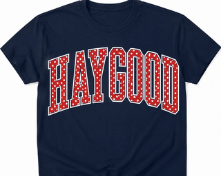 A navy blue short-sleeve t-shirt with the word 'HAYGOOD' printed across the chest in large red letters filled with white polka dots and outlined in white.