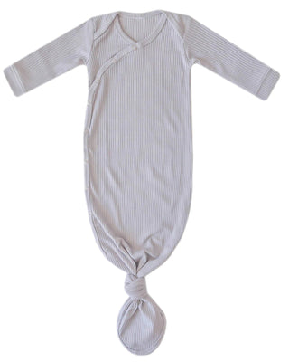 Striped baby knotted gown on a white background