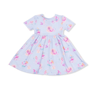 Children's dress with mermaid pattern on a white background