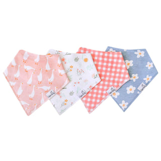 Set of four baby bibs with different patterns on a white background
