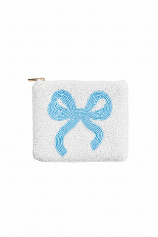 White pouch with a blue beaded bow on a white background