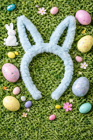 Faux Fur Bunny Ears on a grassy background with Easter eggs and flowers
