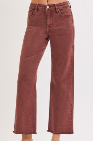 Maroon jeans on a white background