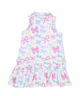 Dress with colorful bow pattern on a white background