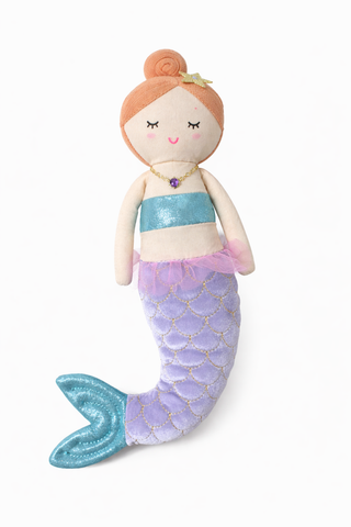 Mermaid plush toy with a purple tail and blue top on a white background