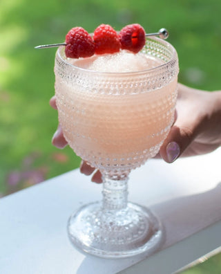 Crystal glass with serving of Froze in it 