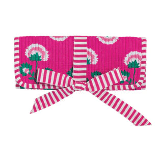 Pink headband with striped pattern and dandelion design on a white background