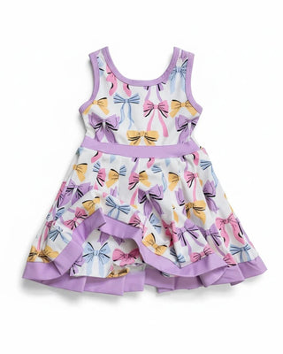 Children's dress with bow pattern on a white background