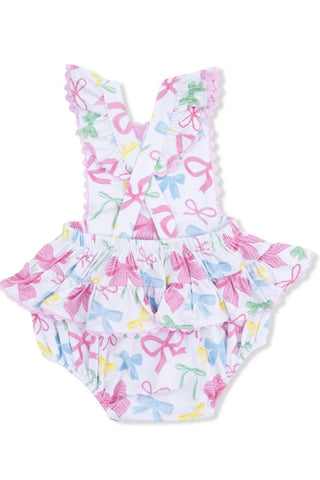 Two-piece swimsuit with bow pattern on a white background