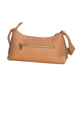 Dusty Rose handbag on a wooden table with a blurred background