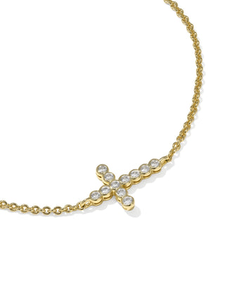 Gold bracelet with diamond accents on a white background