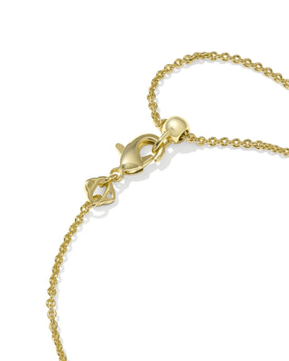 Gold bracelet with a clasp on a white background