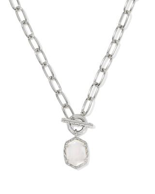 Silver chain necklace with a hexagonal pendant on a white background
