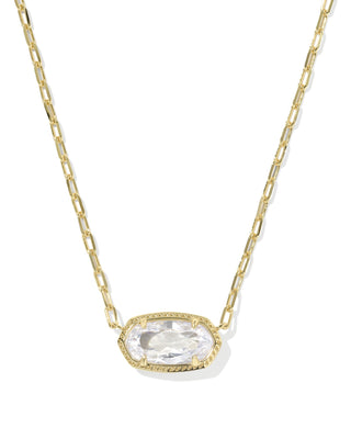 Gold necklace with a clear gemstone pendant on a white background