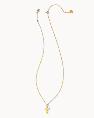 Gold necklace with a cross pendant on a white background