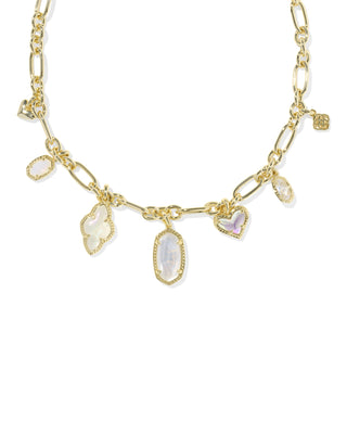 Gold necklace with heart and oval pendants on a white background