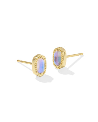 Gold earrings with a central gemstone on a white background