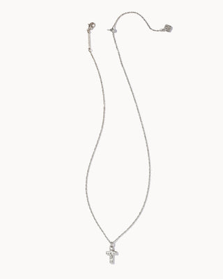 Silver necklace with a cross pendant on a white background