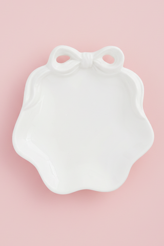 Mud Pie White Bow Ring Dish on pink background