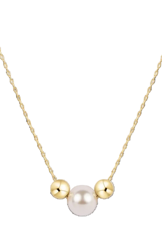 Necklace with a white pearl and two gold beads on a white background