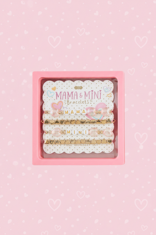 Set of 'Mama & Mini' bracelets in a pink box on a pink background